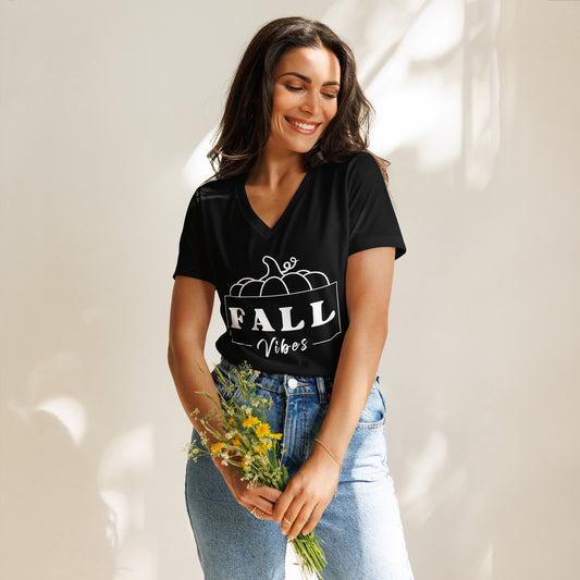 Fall-themed, black V-neck shirt that says "Fall Vibes" with white frame around it and a pumpkin on top.